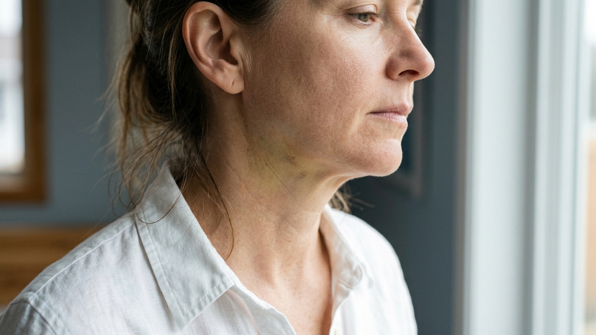 A patient navigating deep plane facelift recovery during weeks two to four while returning to social life.